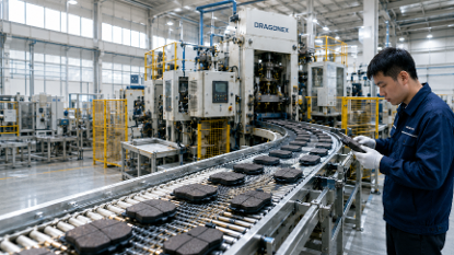 Technician monitoring production line equipment and process data