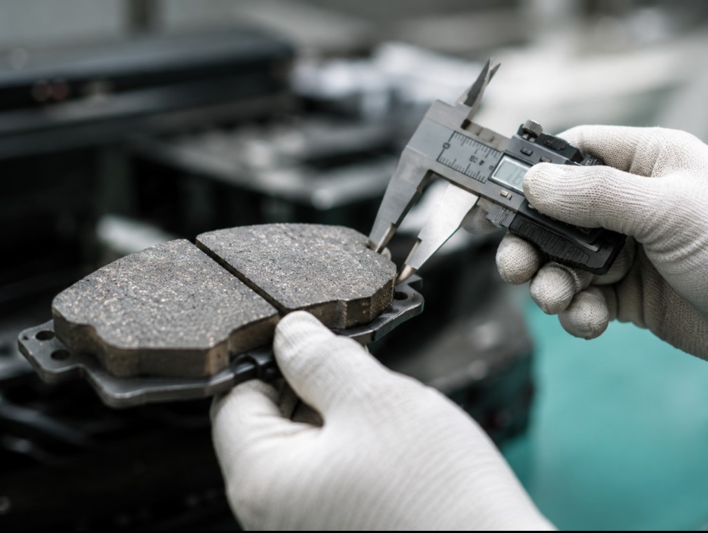 Precision quality inspection of brake pad friction material