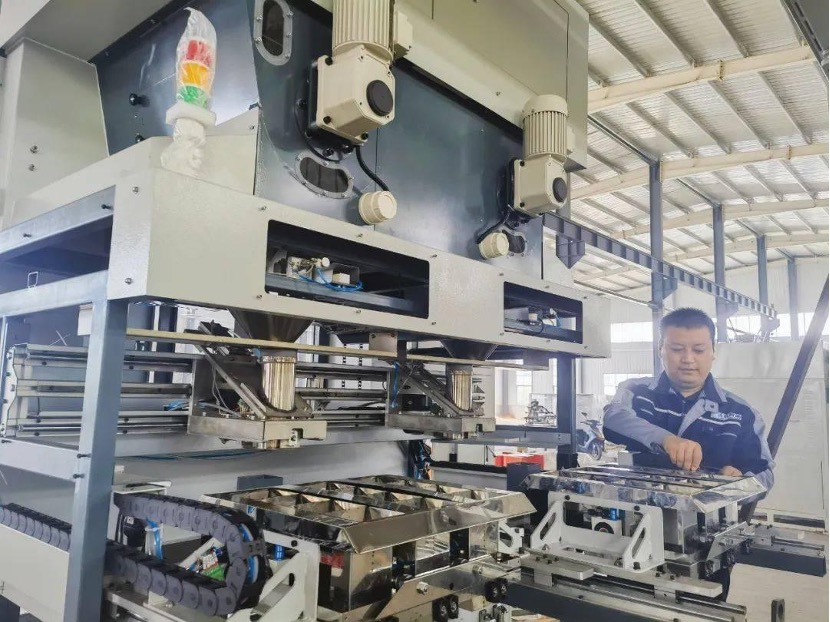Engineer providing on-site technical support at production equipment
